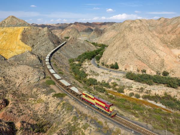 Baiyin Nonferrous Metals Corporation's DF7G 5183 hauls an ore train from the Baiyin zinc mine to the refinery. Pictured north of Baiyin, China.